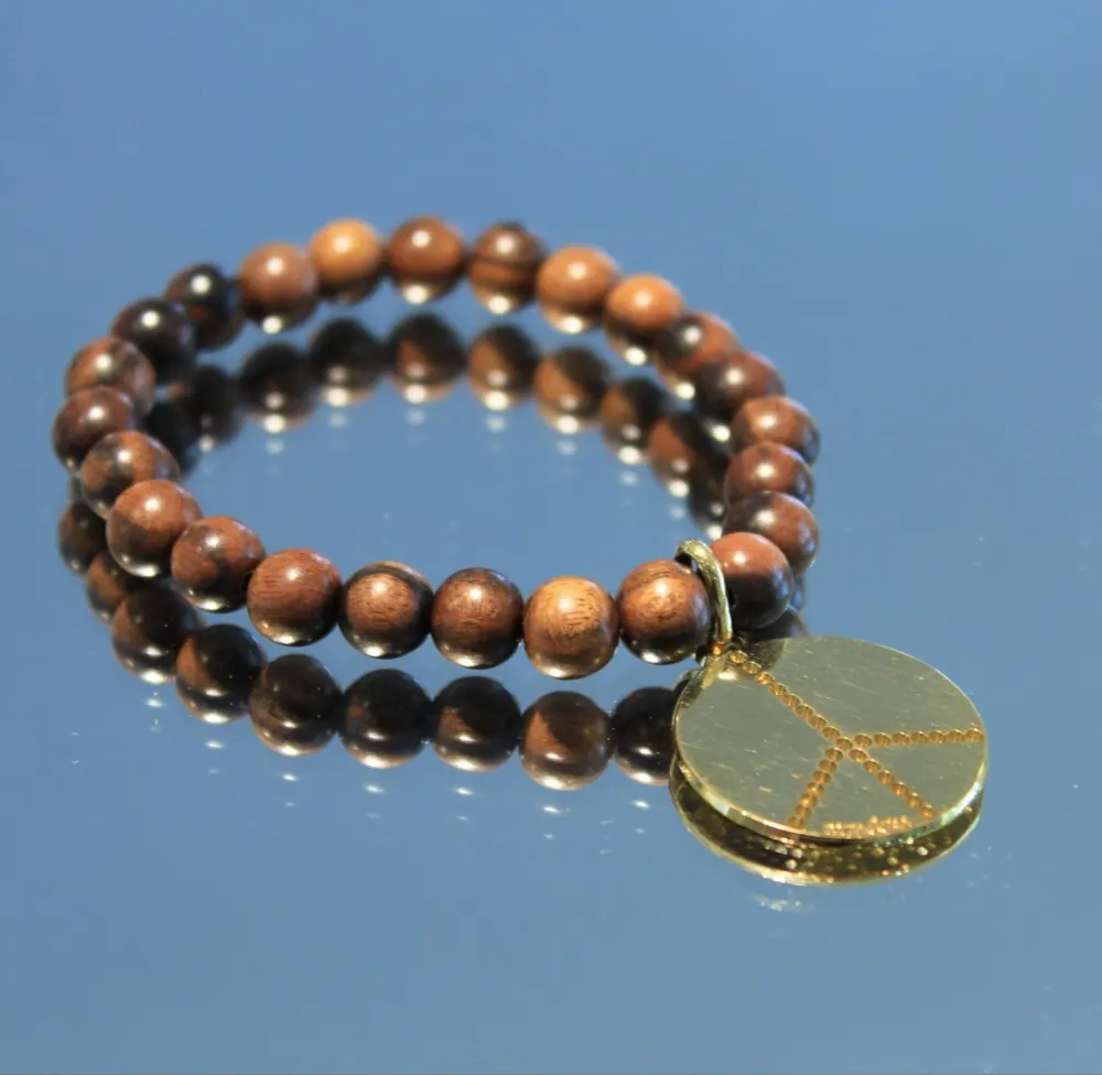 Rita&Zia — Bracelet petit modèle avec des perles de bois et symbole de la paix